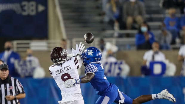 Former Kentucky cornerback Cedrick Dort breaks up a pass against Mississippi State.